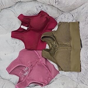 3 Halara high impact sports bras . Pine green, burgundy, pink mauve